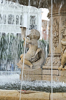 Neobaroque marble fountain in Plaza de Espana Square in Merida photo