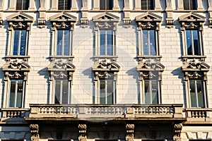 neoclassical facade with elaborate stone carvings