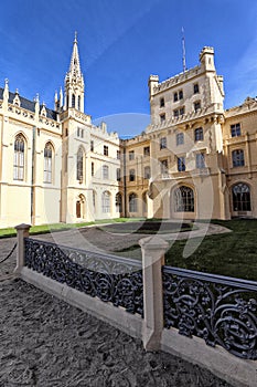 Neogothic castle with ornamental beige facade