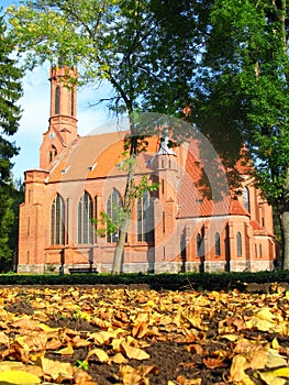 Neogothic church in autumn photo
