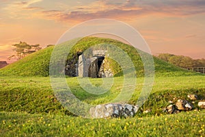 Neolithic Burial Mound in Wales at Sunset photo