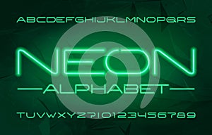 Neon alphabet font. Green neon color letters and numbers.