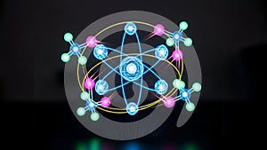 Neon atomic structure model on dark background