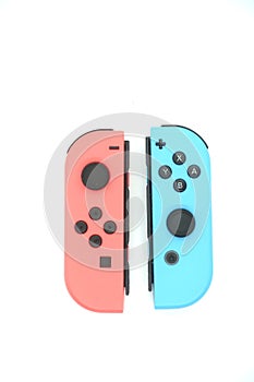 A neon blue and neon red Nintendo Switch joycon