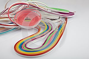 Neon flexible strip light. Flexible led tape neon flex in different colors on white background