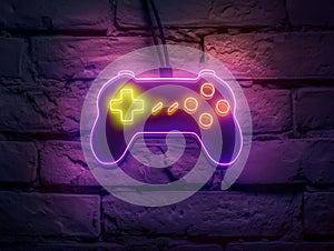 Neon Game Controller Sign on Brick Wall