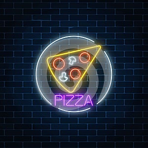 Neon glowing sign of pizza in circle frame on a dark brick wall background. Fastfood light billboard symbol.