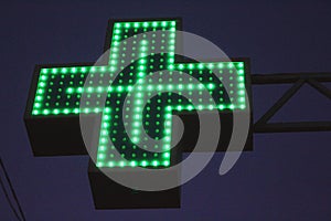 Neon green cross sign