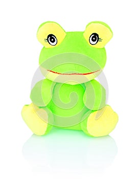 Neon green frog plushie toy isolated on white background with shadow reflection. Chartreuse frog doll isolated on white underlay.