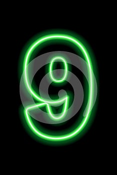 Neon green number 9 on black background. Learning numbers, serial number, price, place