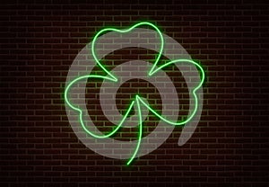 Neon green Shamrock sign vector isolated on brick wall. Light Happy Patric shop decoration element.