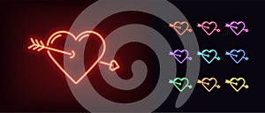 Neon heart icon. Glowing neon heart sign with cupid arrow, amour shape