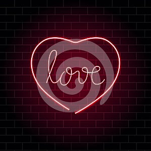 Neon heart with phrase Love. Bright neon signboard on brick wall background with backlight. Retro red neon heart sign for Happy