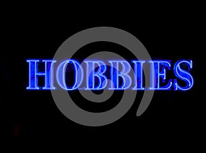 Neon hobbies sign photo