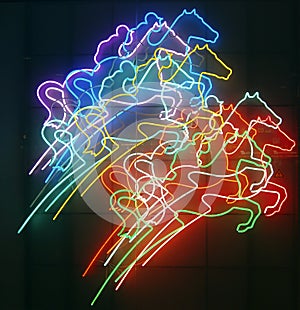 Neon horses and riders photo