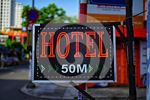 Neon Hotel sign 50 metres