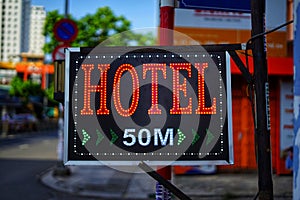 Neon Hotel sign 50 metres photo
