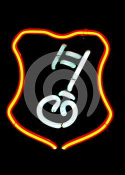 Neon key shaped sign