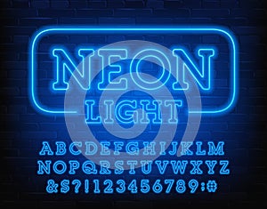 Neon Light alphabet font. Blue neon light letters and numbers. Brick wall background.