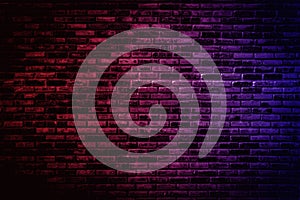 Neon light on brick walls that are not plastered background and texture. Lighting effect red and blue neon background vertical of