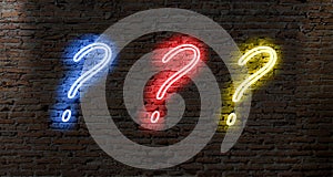 neon light question marks on a dark brick wall