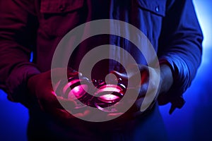 Neon light studio, man model, close-up portrait, neon clothes