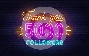 Neon message Thank You 5000 Followers on brick wall background