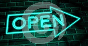 Neon open sign glowing and illuminated at a store entrance - 4k