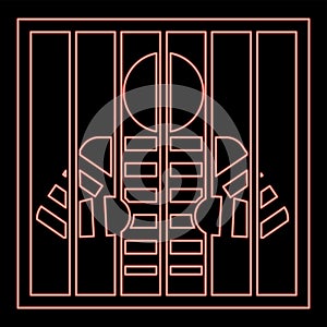 Neon prisoner behind bars holds rods with his hands Angry man watch through lattice in jail Incarceration concept red color