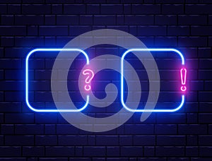 Neon quiz banner set. Glowing question and exclamation mark. Color neon banner on brick wall. Realistic bright night