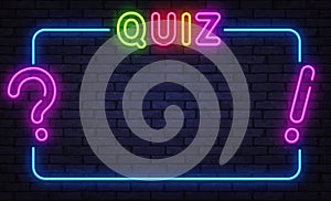Neon quiz screen with question and exclamation marks on dark wall background photo