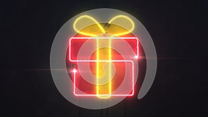 Neon red and yellow illuminated gift shape on dark background