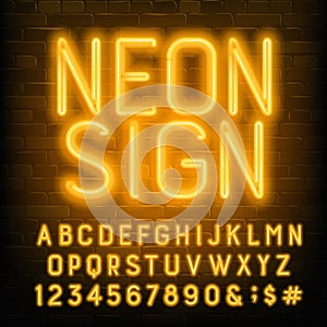Neon Sign alphabet font. Yellow neon letters and numbers. Brick wall background.