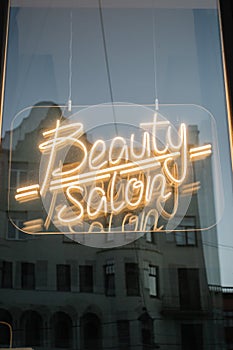 neon sign beauty salon makeup In the window showcase