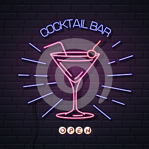 Neon sign cocktail bar on brick wall background. Vintage electric signboard