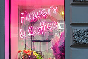 Neon sign flowers and coffee. romantic floral gifts. nature love