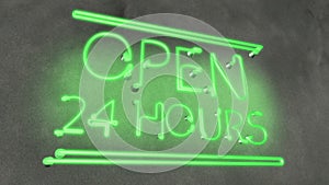 Neon sign Open 24 hours in cafe bar restaurant, working evening night local pub
