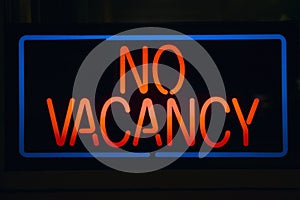 Neon sign reads No Vacancy photo