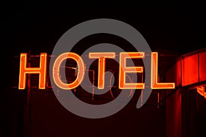 Neon sign of a small hotel.