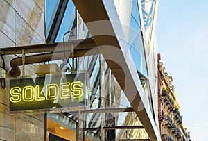 Neon sign with word SOLDES transalted as SALES