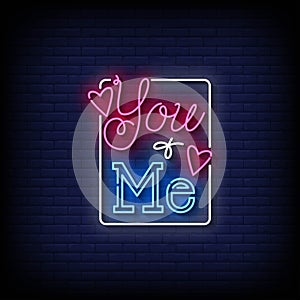 Neon Sign you and me with brick wall background vector