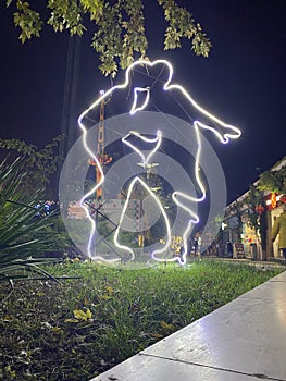 Neon silhouette of dancing couple