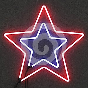 Neon star on concrete background