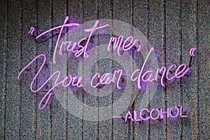 Neon text sign: Trust me, you can dance