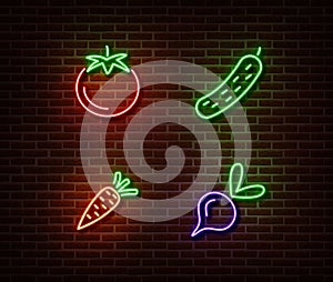 Neon vegetables signs vector isolated on brick wall. Tomato, cucumber, carrot, beetroot light symbol