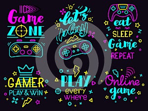 Neon video game phrases. Online game console lettering, modern gamer joystick concept, video games lettering isolated