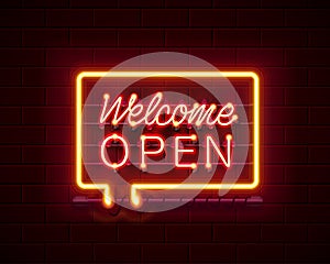 Neon welcome open signboard on the brick wall background.