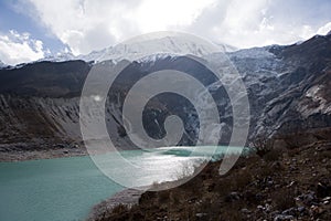 Nepal. Glacial lake at mountain Manaslu bottom