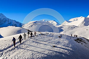 Group of mountain trekkers in Himalayan mountains near Thorong La pass, Annapurna region