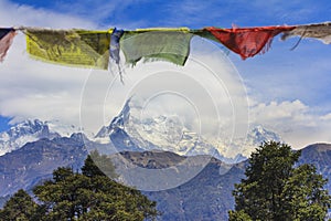 Nepal prayer flags and Annapurna mountain range, Nepal